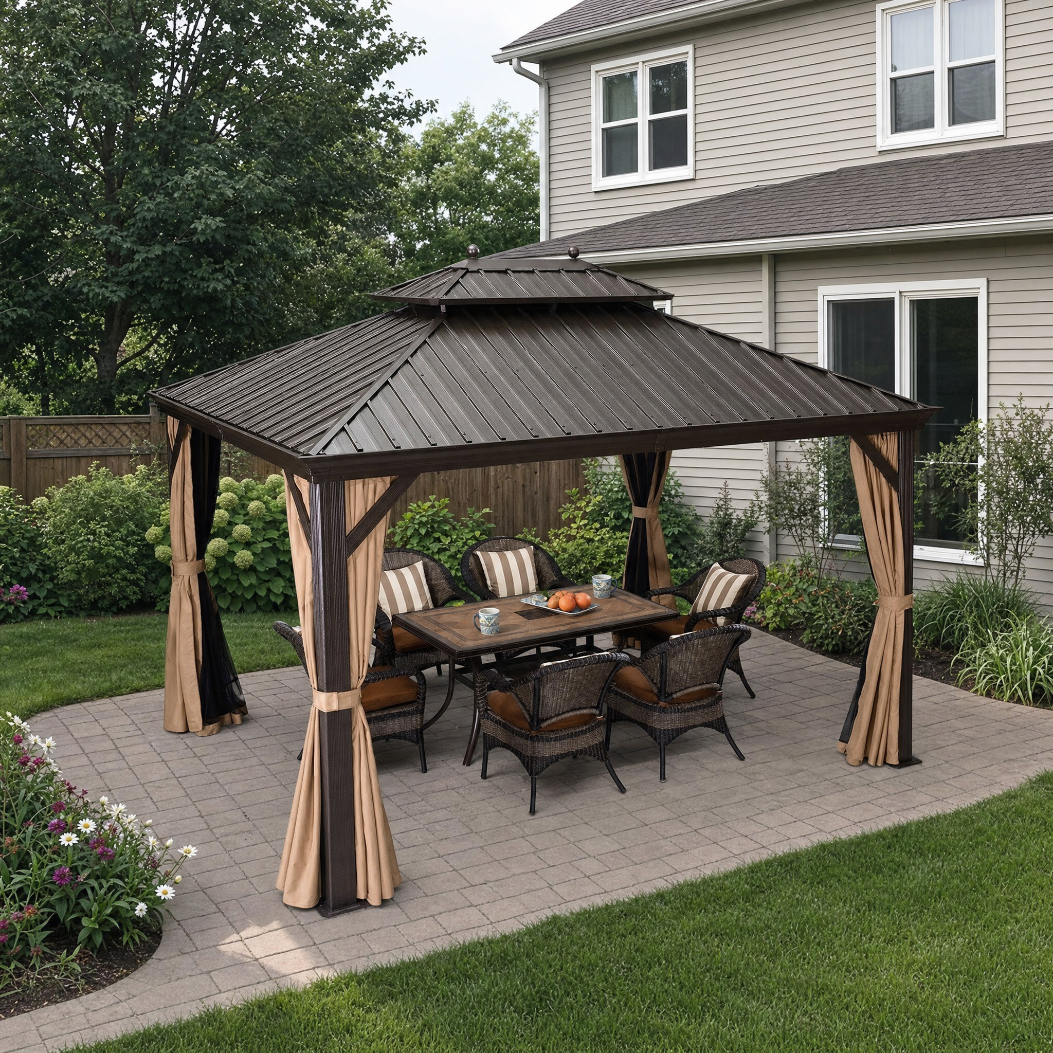 Bronze double-tier hardtop gazebo with netting and wicker dining set in backyard