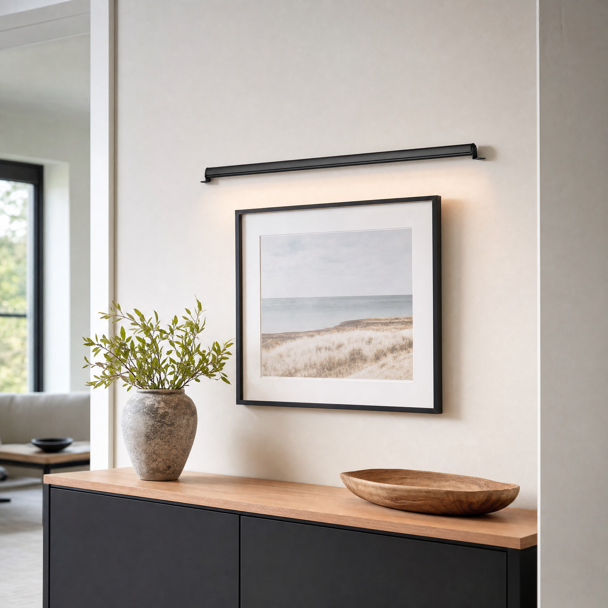 Linear LED bar light as a picture light over framed art