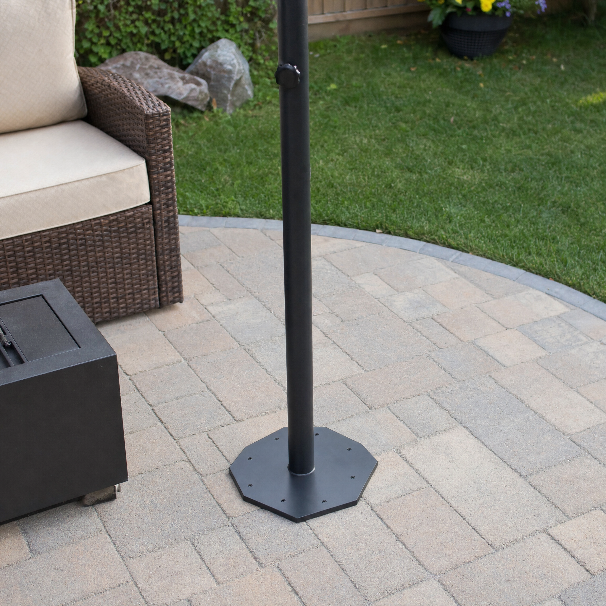 PURPLE LEAF in-ground umbrella base plate anchoring cantilever umbrella on paver patio